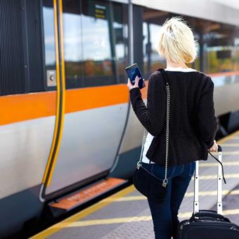 depositphotos woman waiting for train