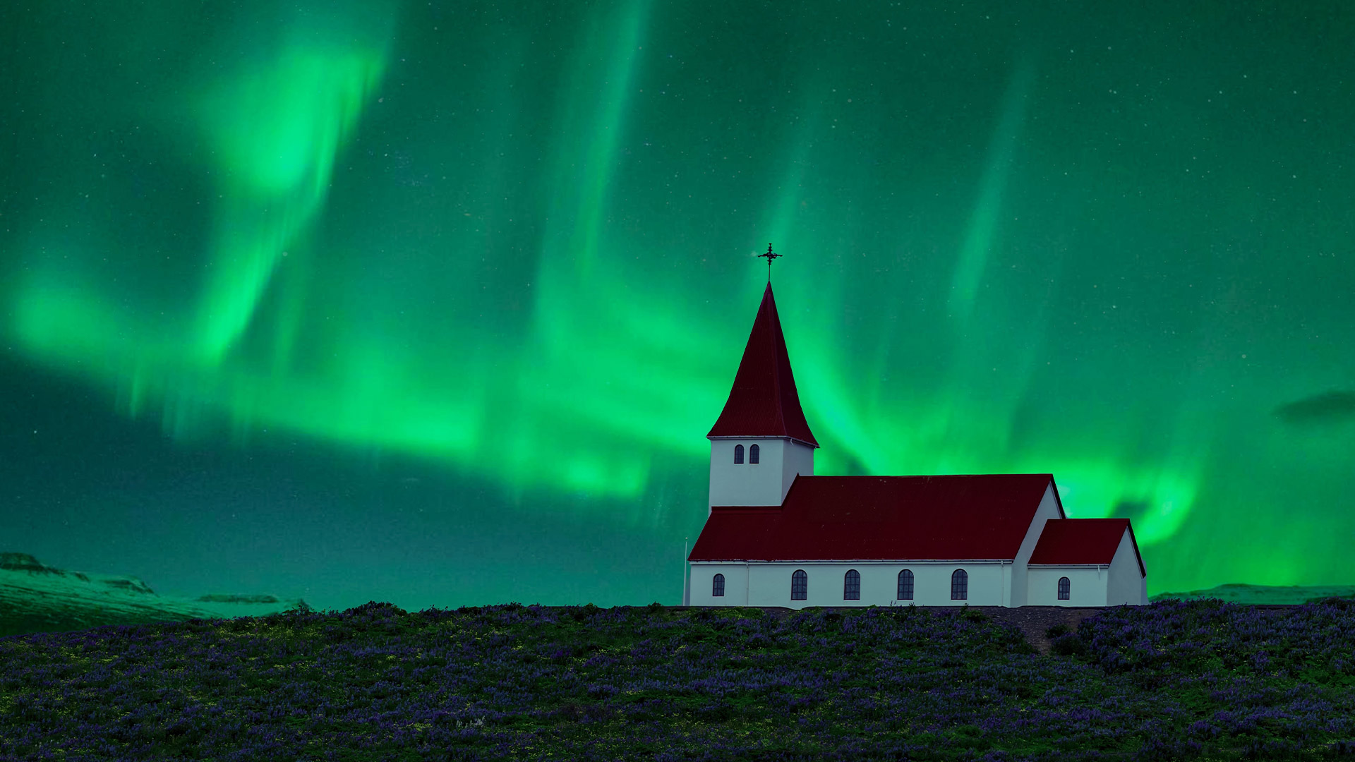 Northern Lights over church in Vik i Myrdal church Iceland