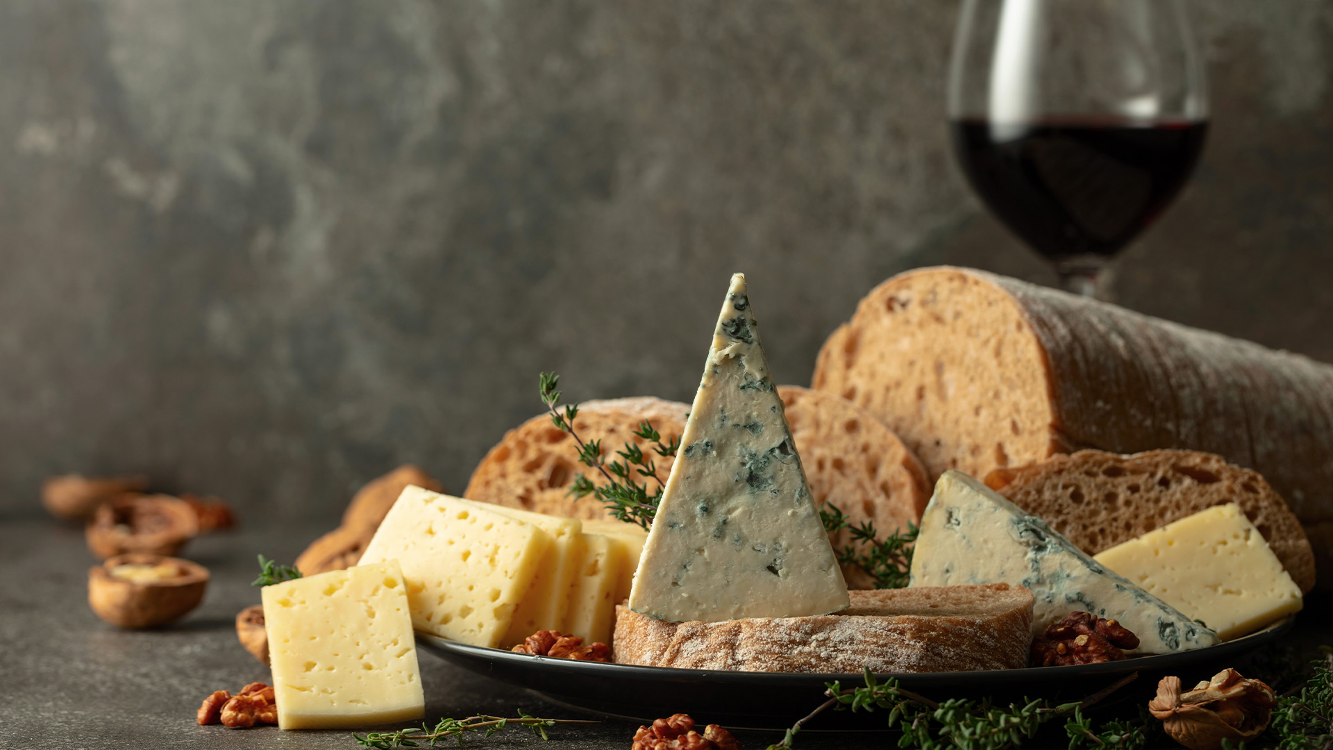 Cheese and bread served with wine in Mediterranean style