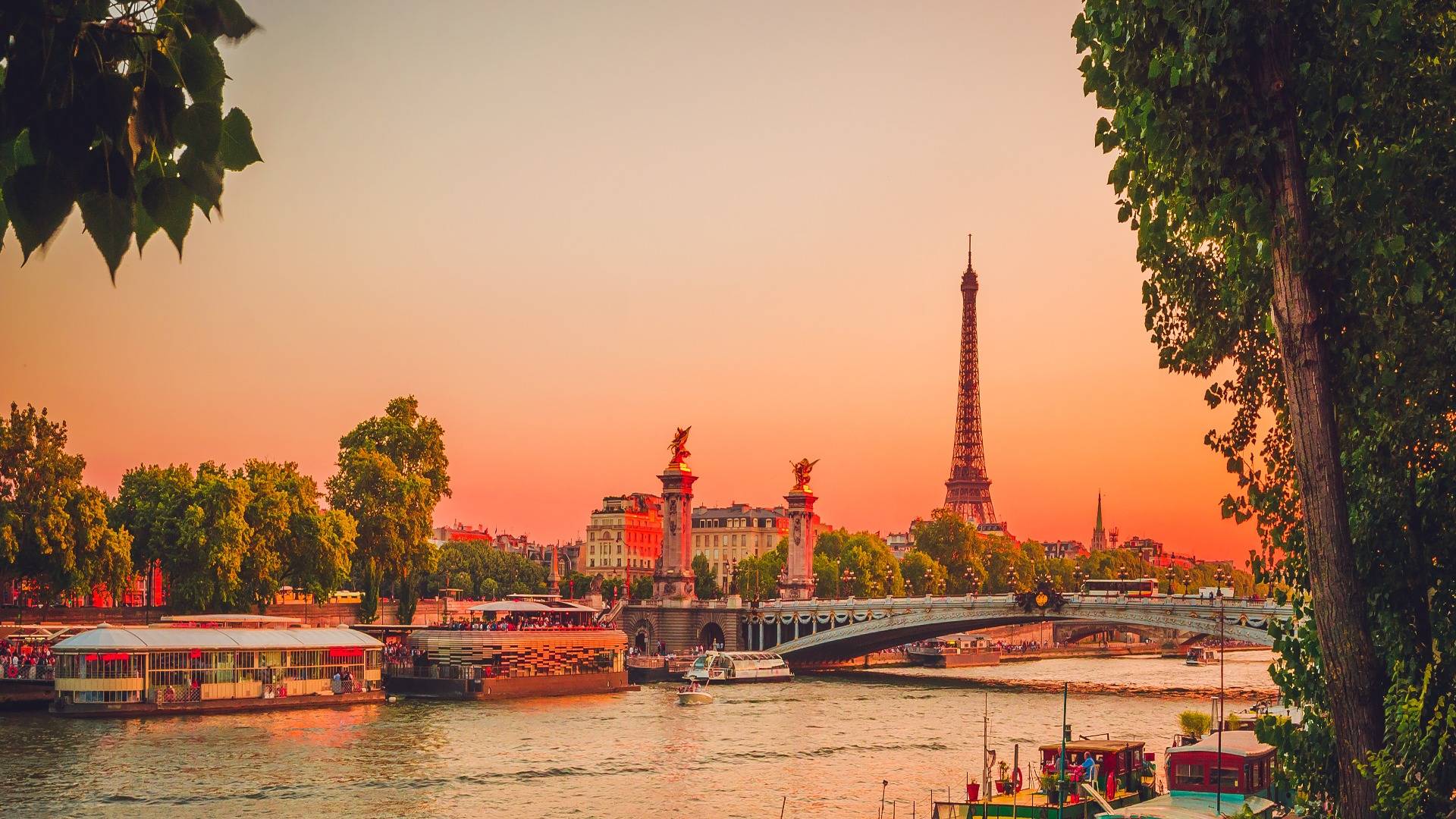 View of the River Seine at sunset with the Eiffel Tower in the background