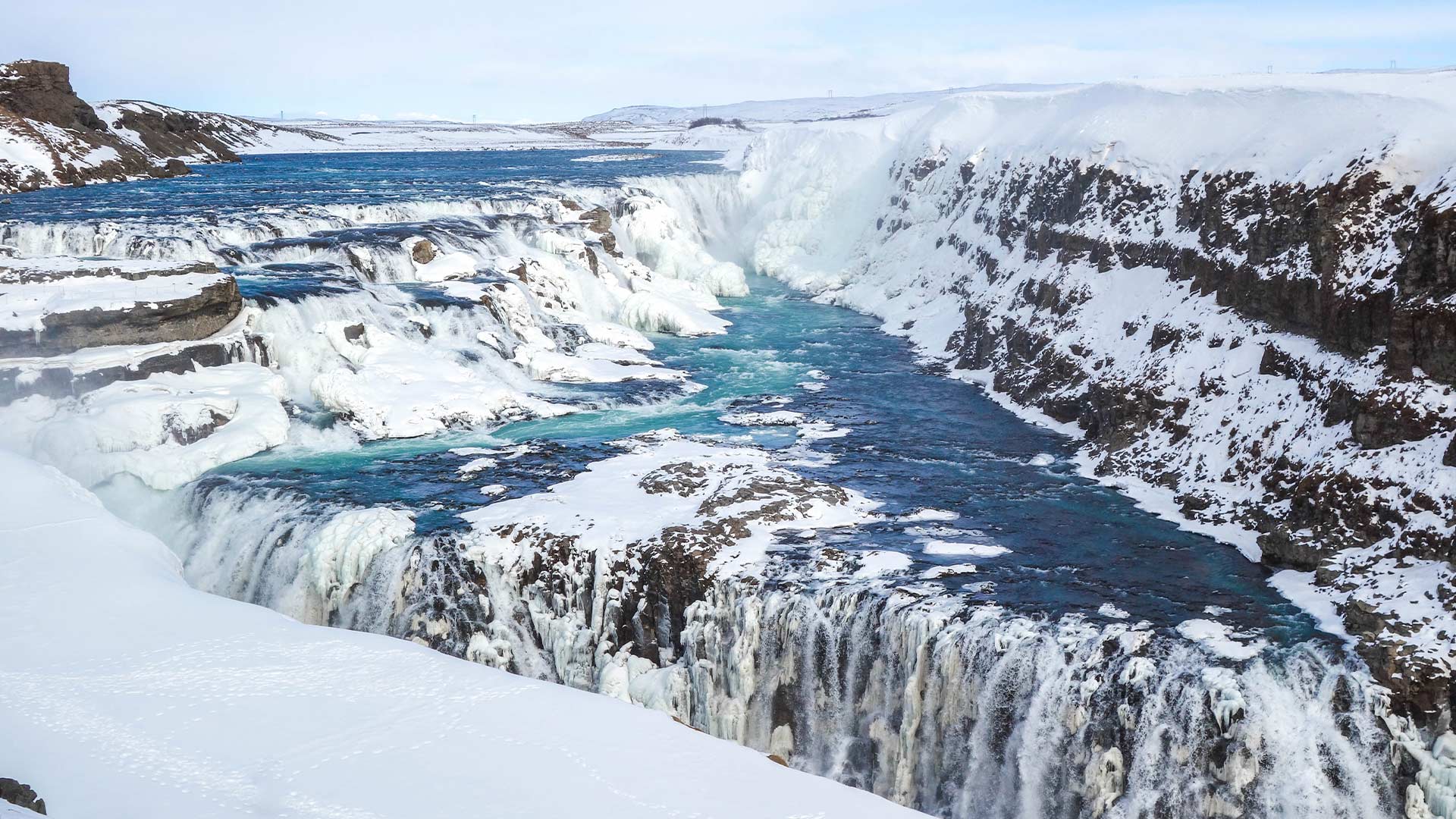 Snowy winter view of Gullfoss waterfall, Iceland