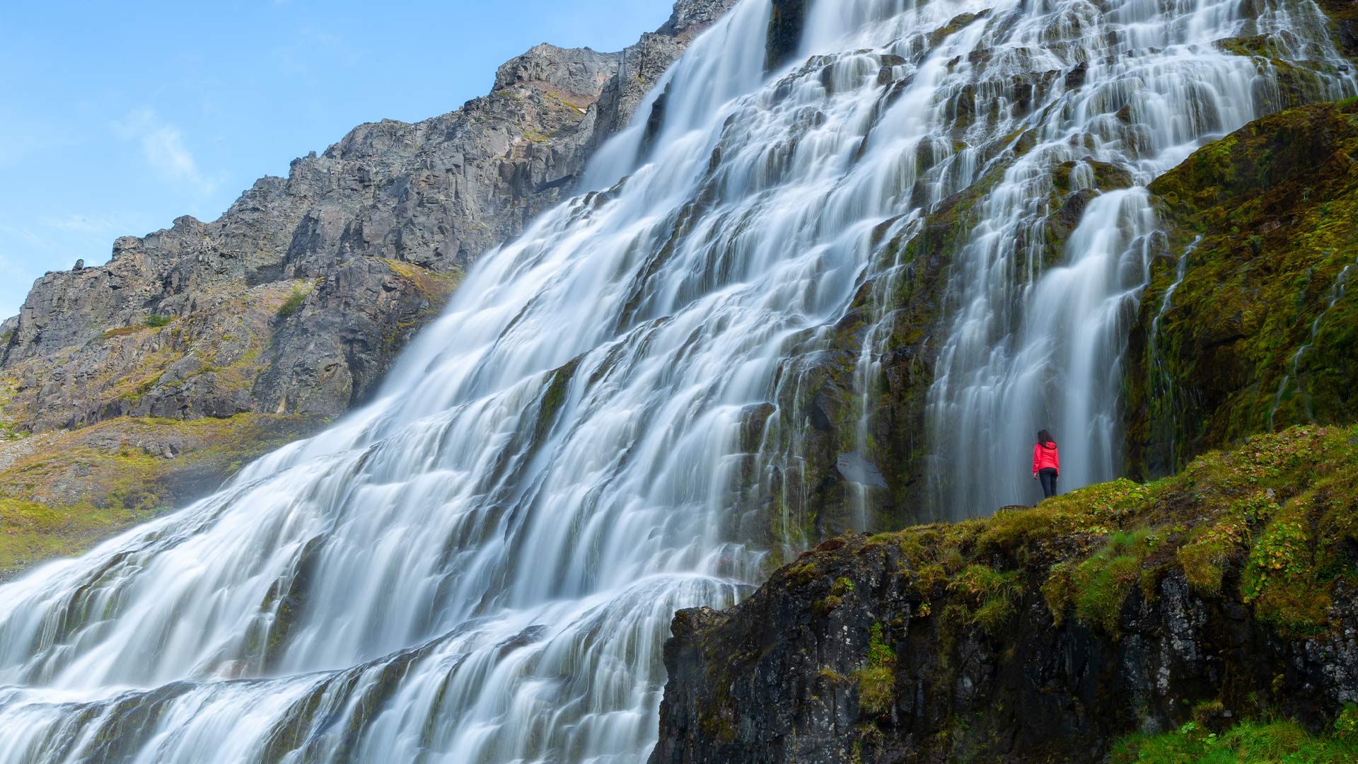 Dynjandi waterfall cascading down cliffs Westfjords Iceland