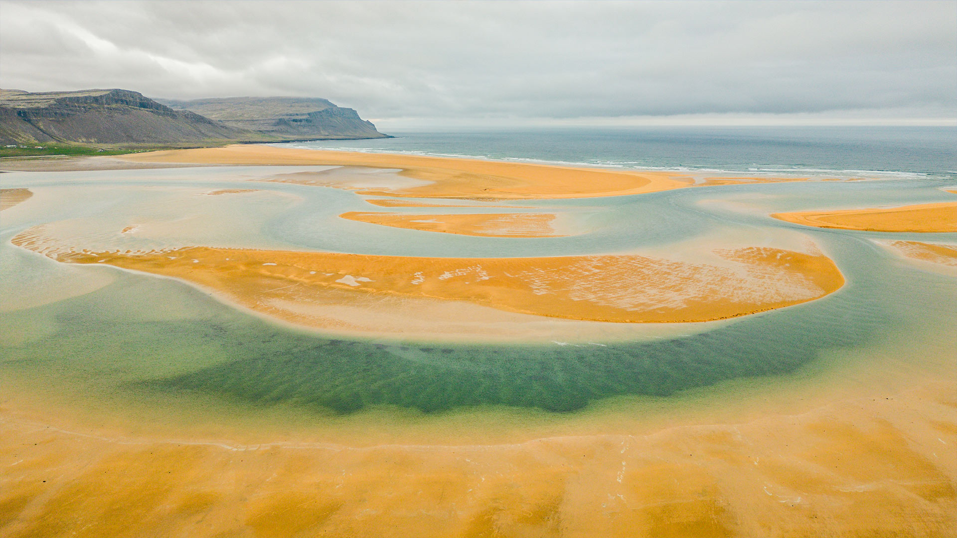 Scenic red sand coastline Rauðisandur beach Iceland Westfjords