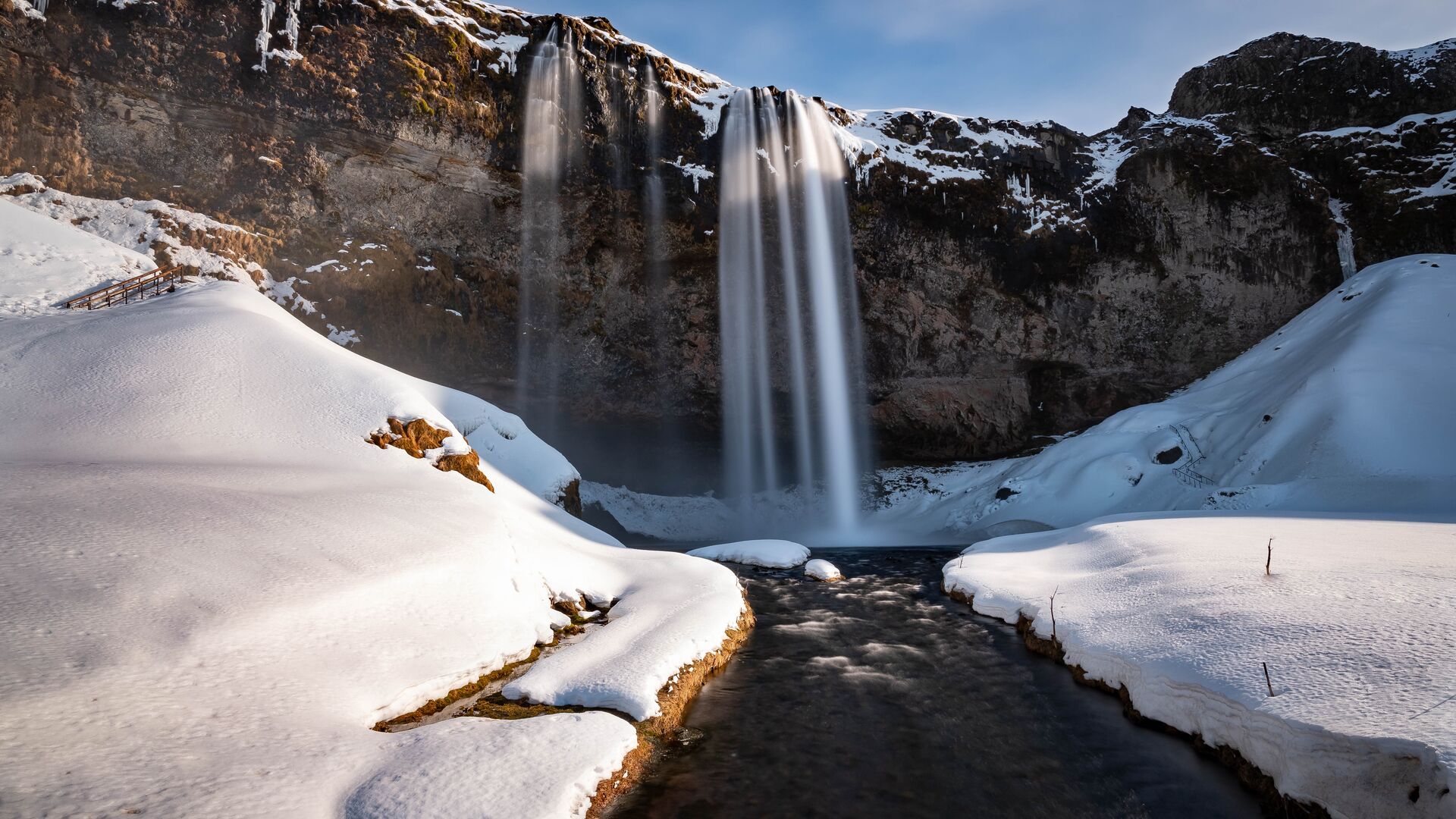 View of the Seljalandsfoss waterfall in Iceland in winter