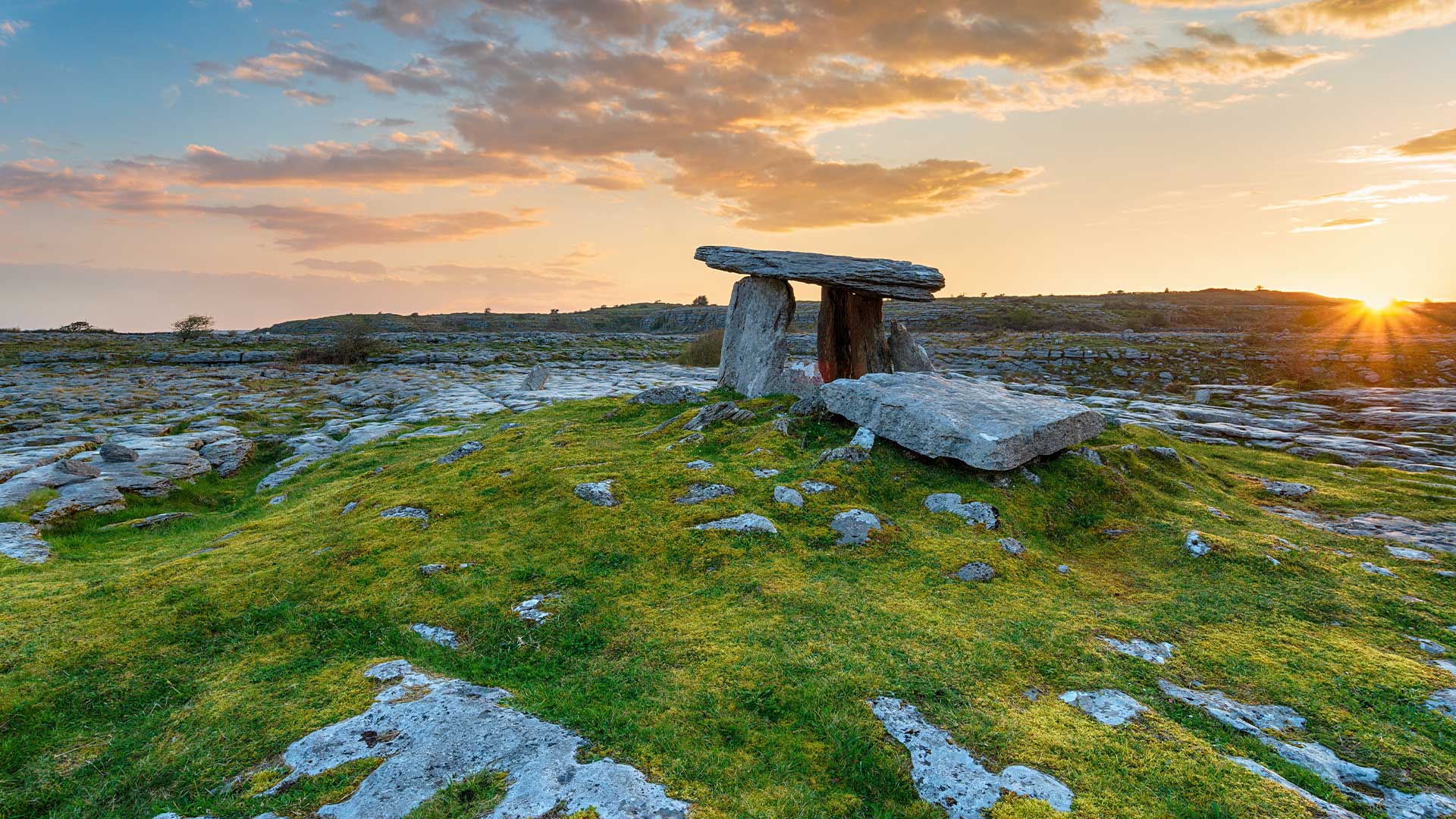 Poulnabrone Dolmen at the Burren at sunrise in County Clare