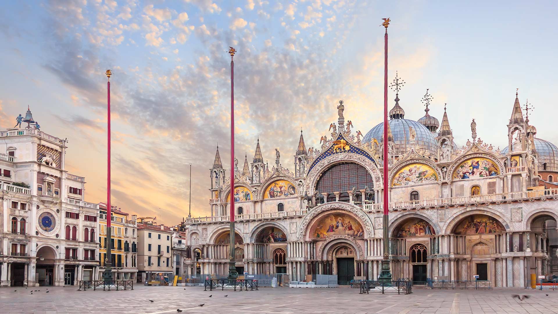 St Mark's Basilica and Clock Tower in St Mark's Square, Italy