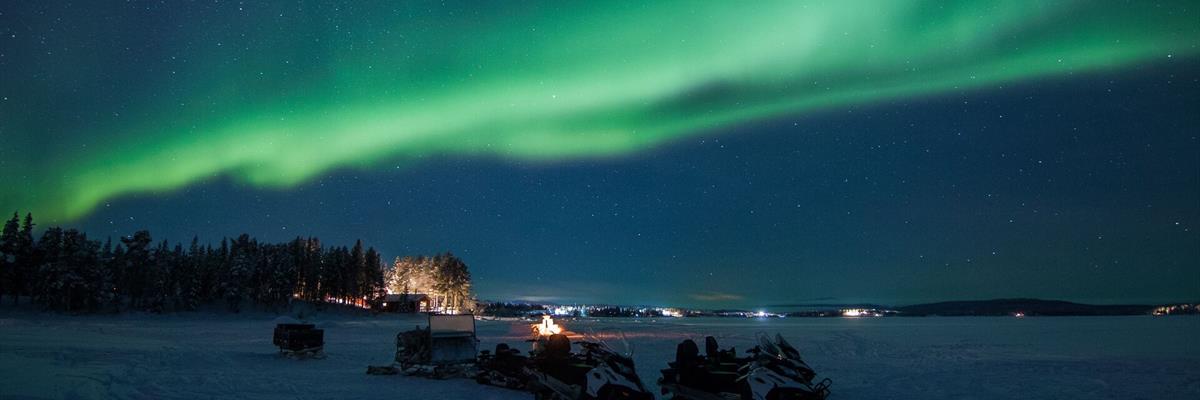 Snowmobile tour with northern lights ©Kiruna Guidetur