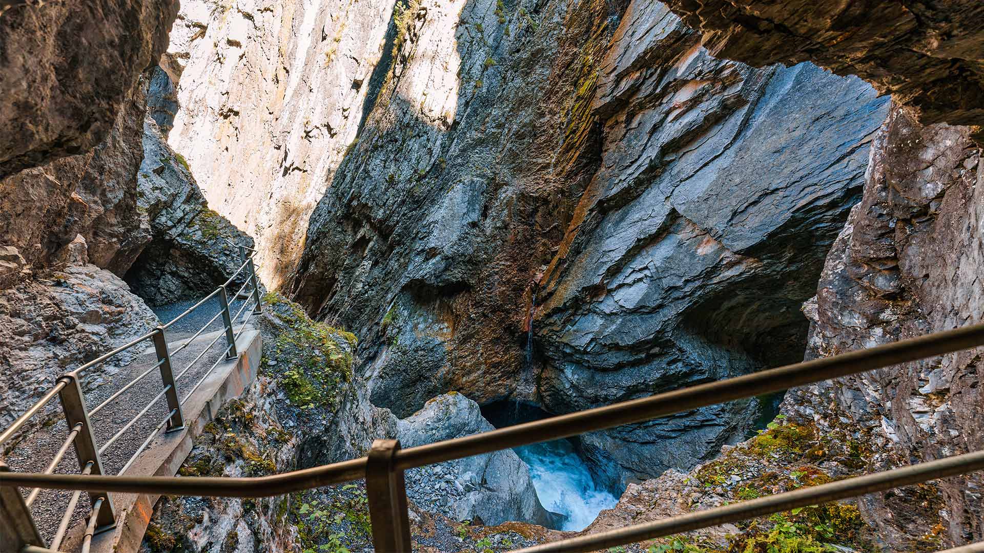 Natural limestone cave in Rosenlaui Glacier Gorge