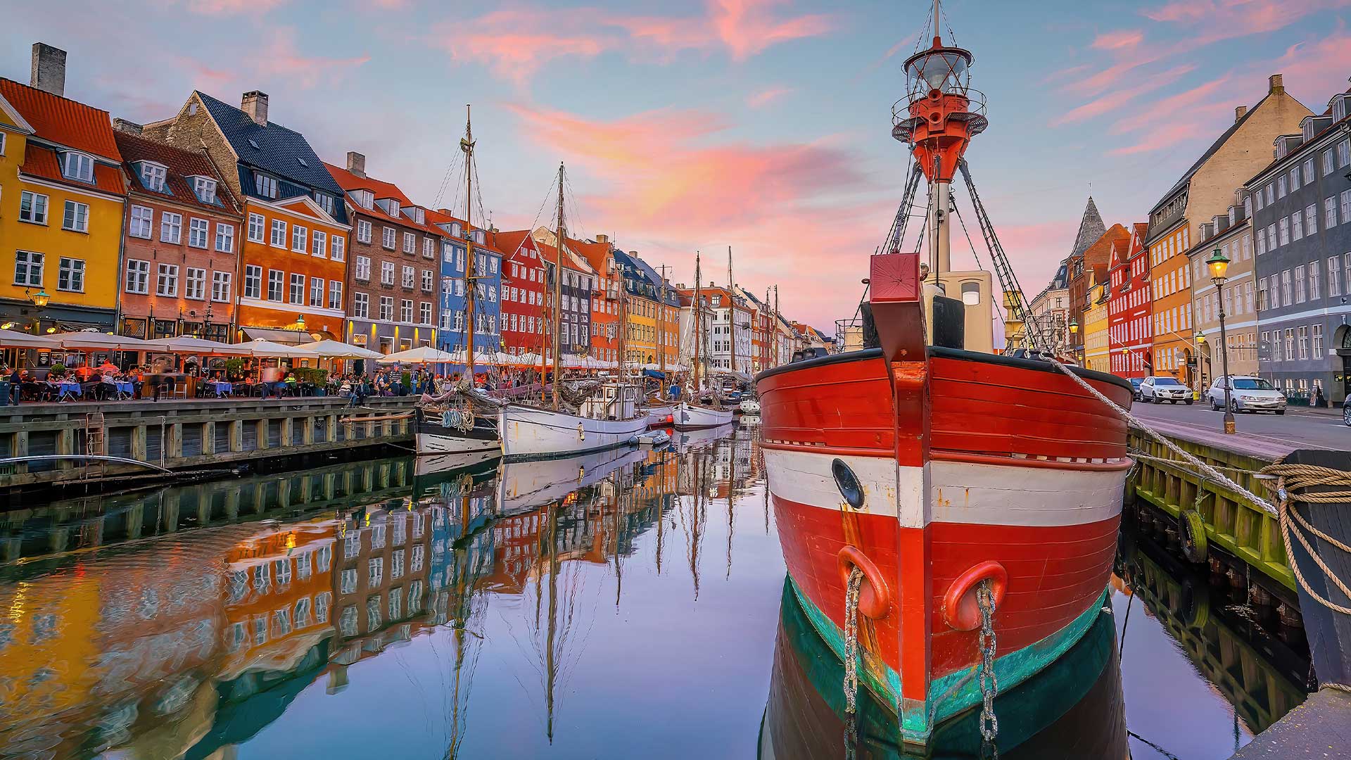 Nyhavn waterfront seen from the canal on a summer evening