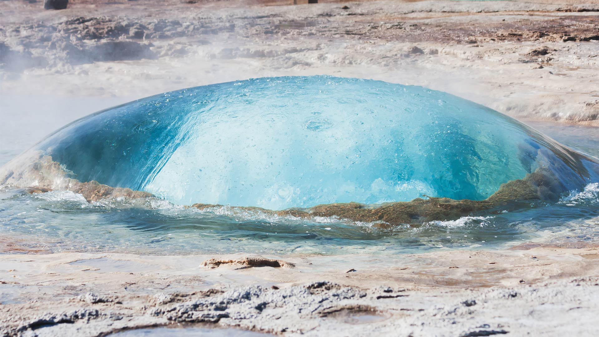 Strokkur geysir captured before an explosion