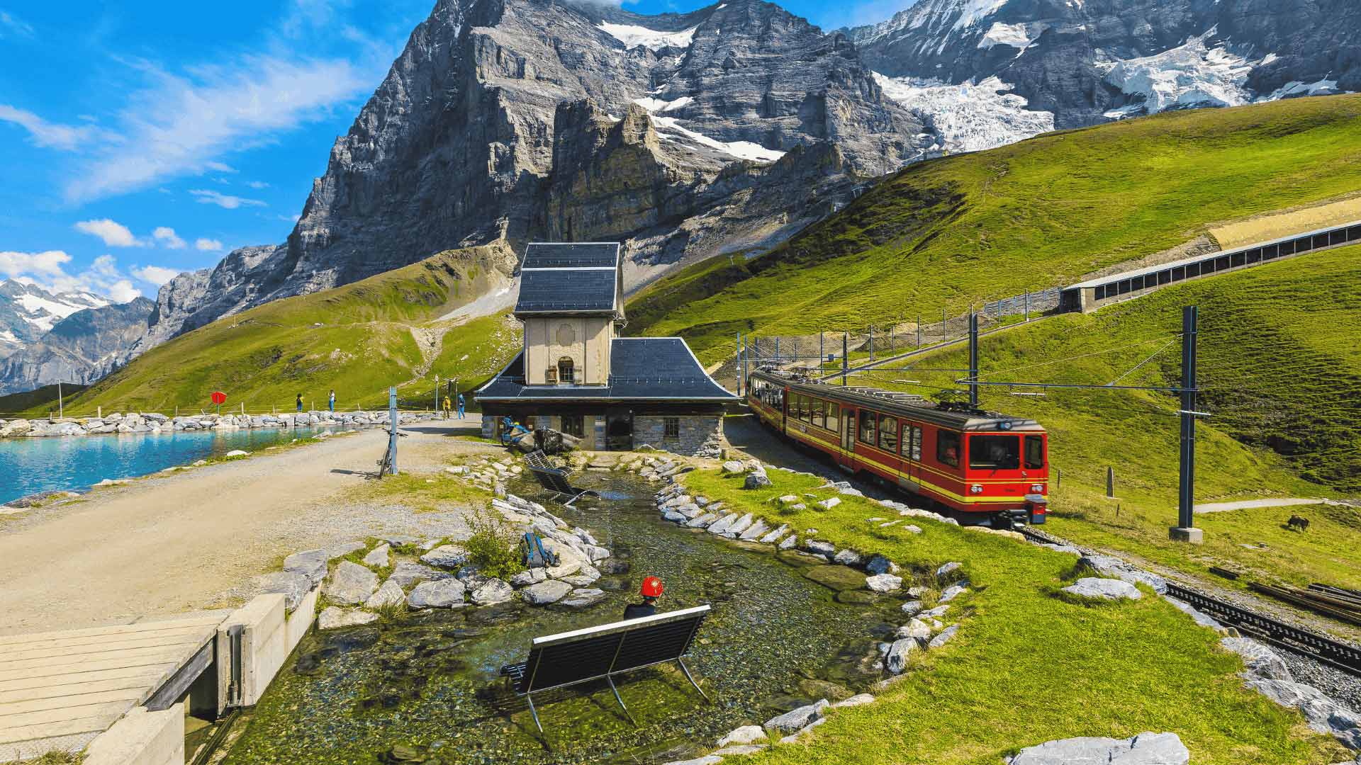 Red cogwheel train at Jungfraujoch mountain station Switzerland