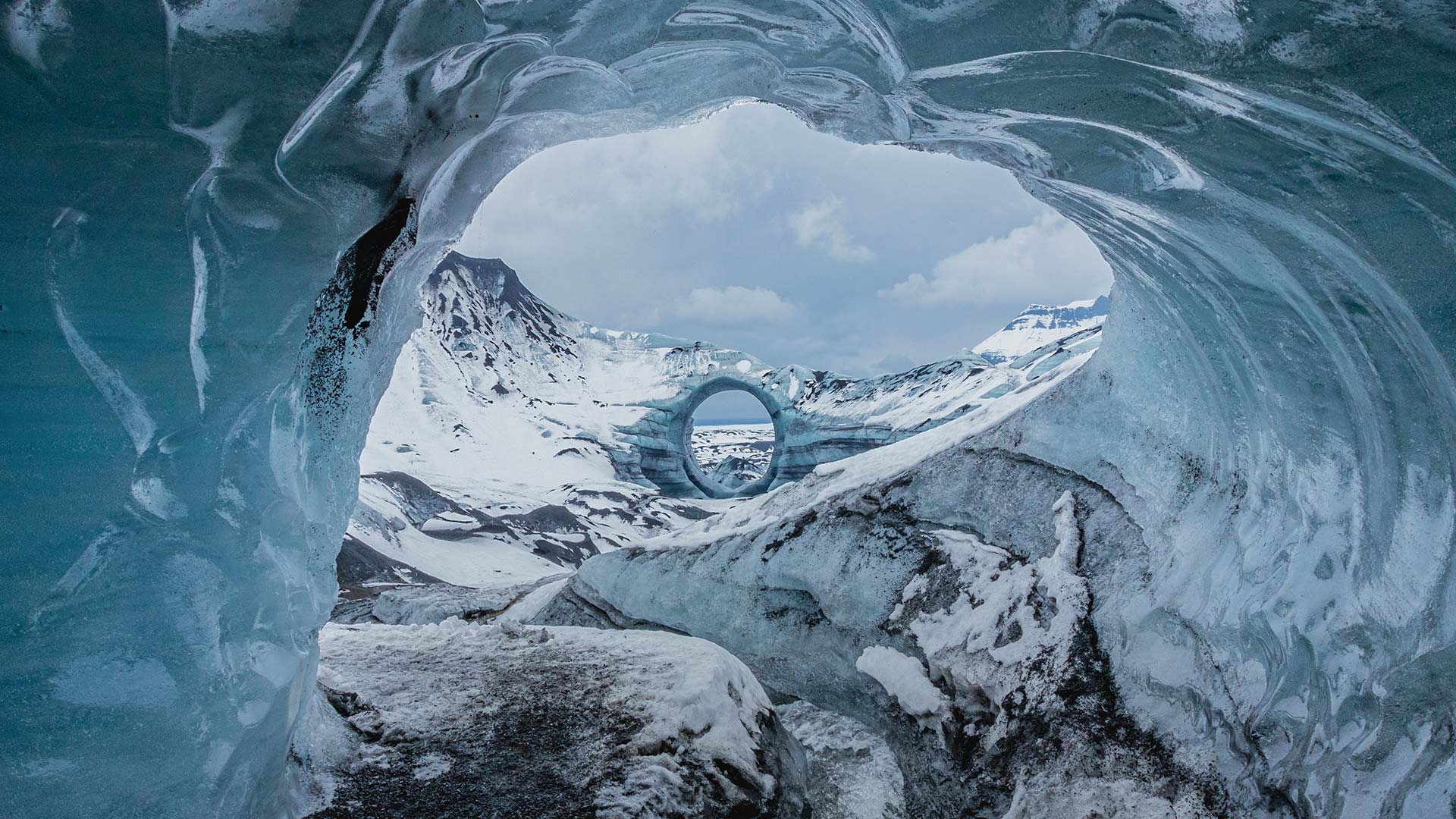 Myrdalsjokull glacier and Katla ice cave arch, Iceland