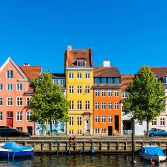 ad168308433 colourful houses along canal in downtown district of copenhagen denmark