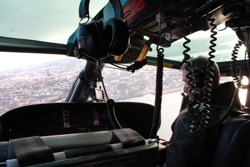 Roger that! a man piloting a helicopter