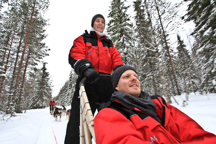 Hjalti (driving) and Ásberg (seated) testing out their management skills on a team of huskies.