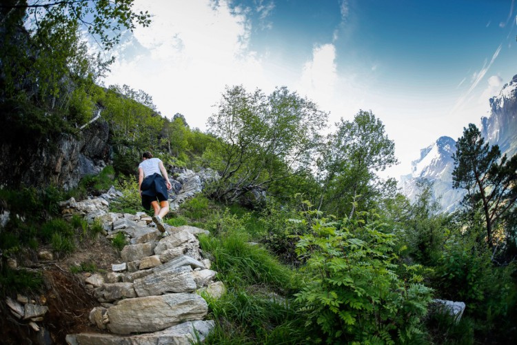 Michelle tackles the natural stone stairs comprising part of the path toward Norway's Romsdalseggen Ridge.