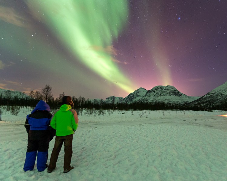 The northern lights dance over Tromso, Norway. Photo taken December 2014 by Nordic Visitor traveller Sitthivet Santikarn.
