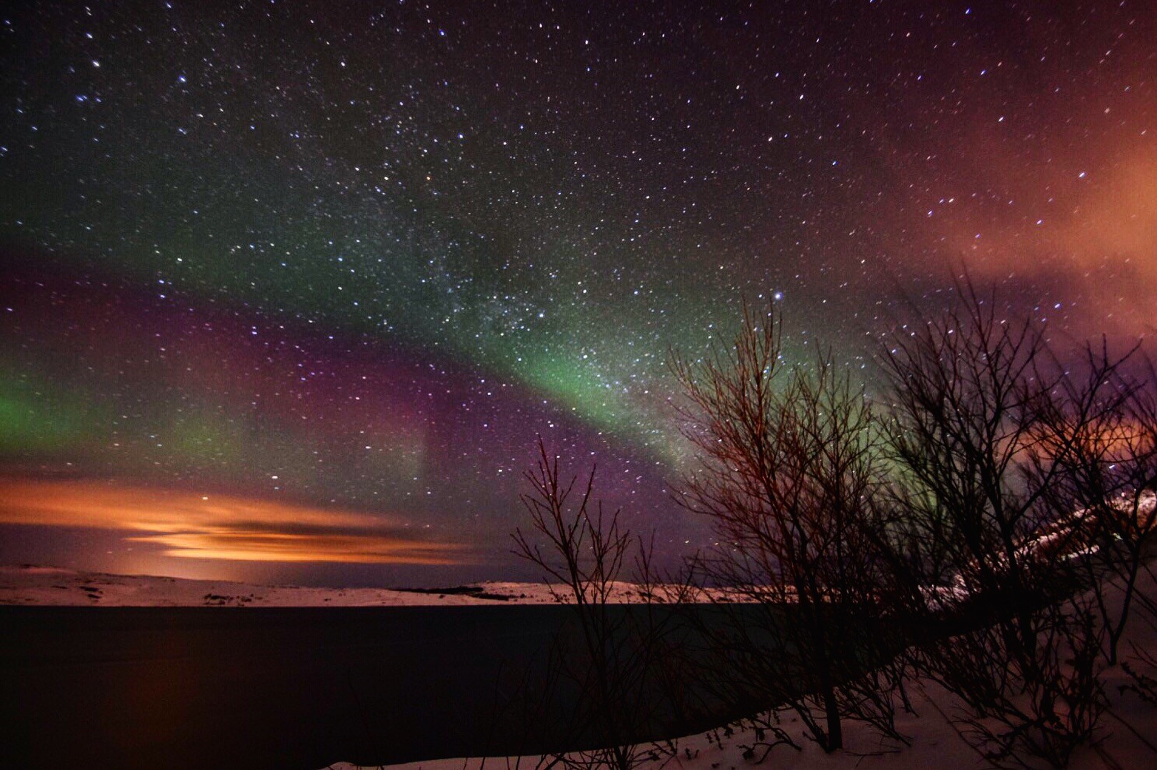 Aurora borealis shining over Kirkenes, Norway