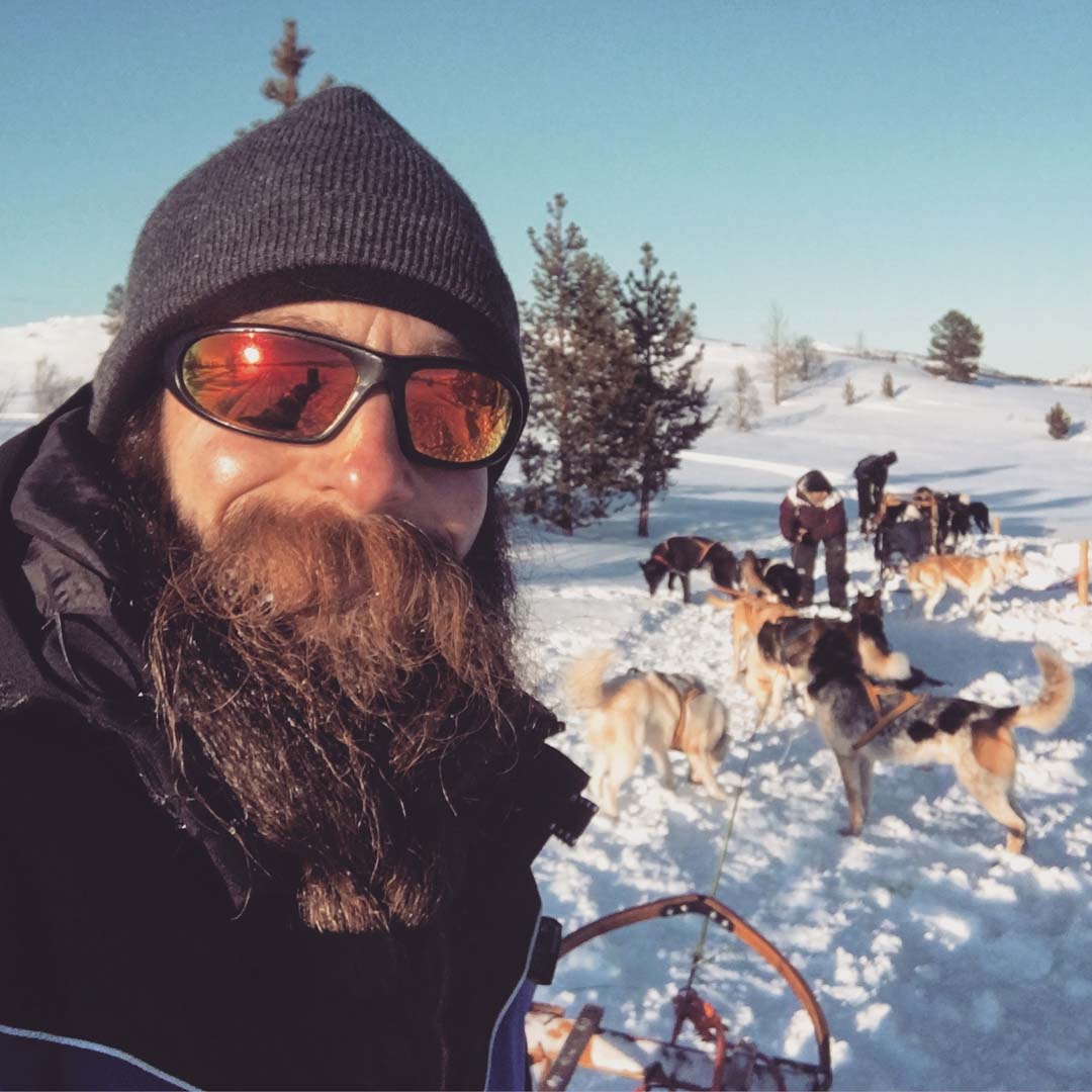 Jay Close dog sledding in arctic Norway