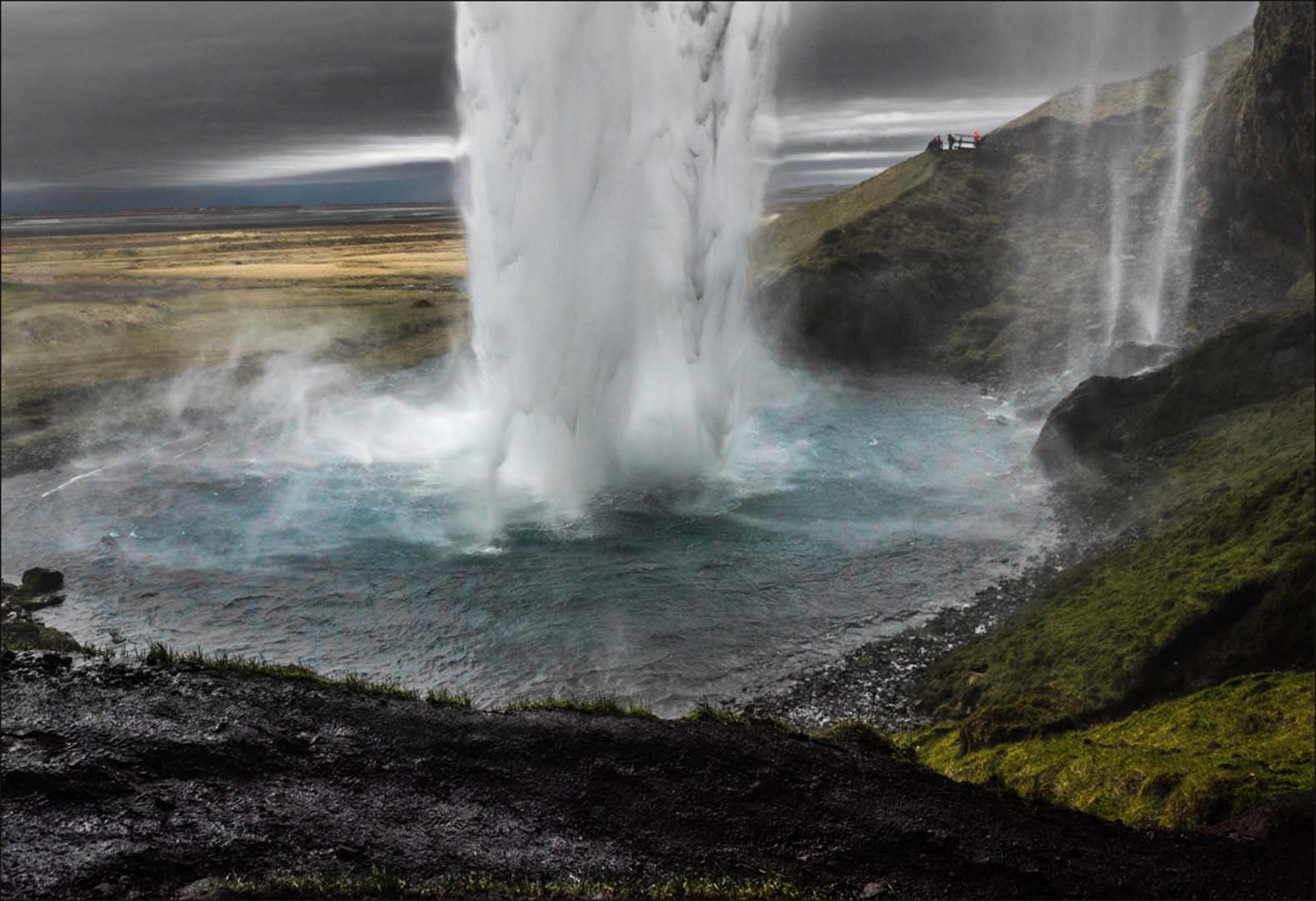 Behind the Seljalandsfoss waterfall on the walking trail