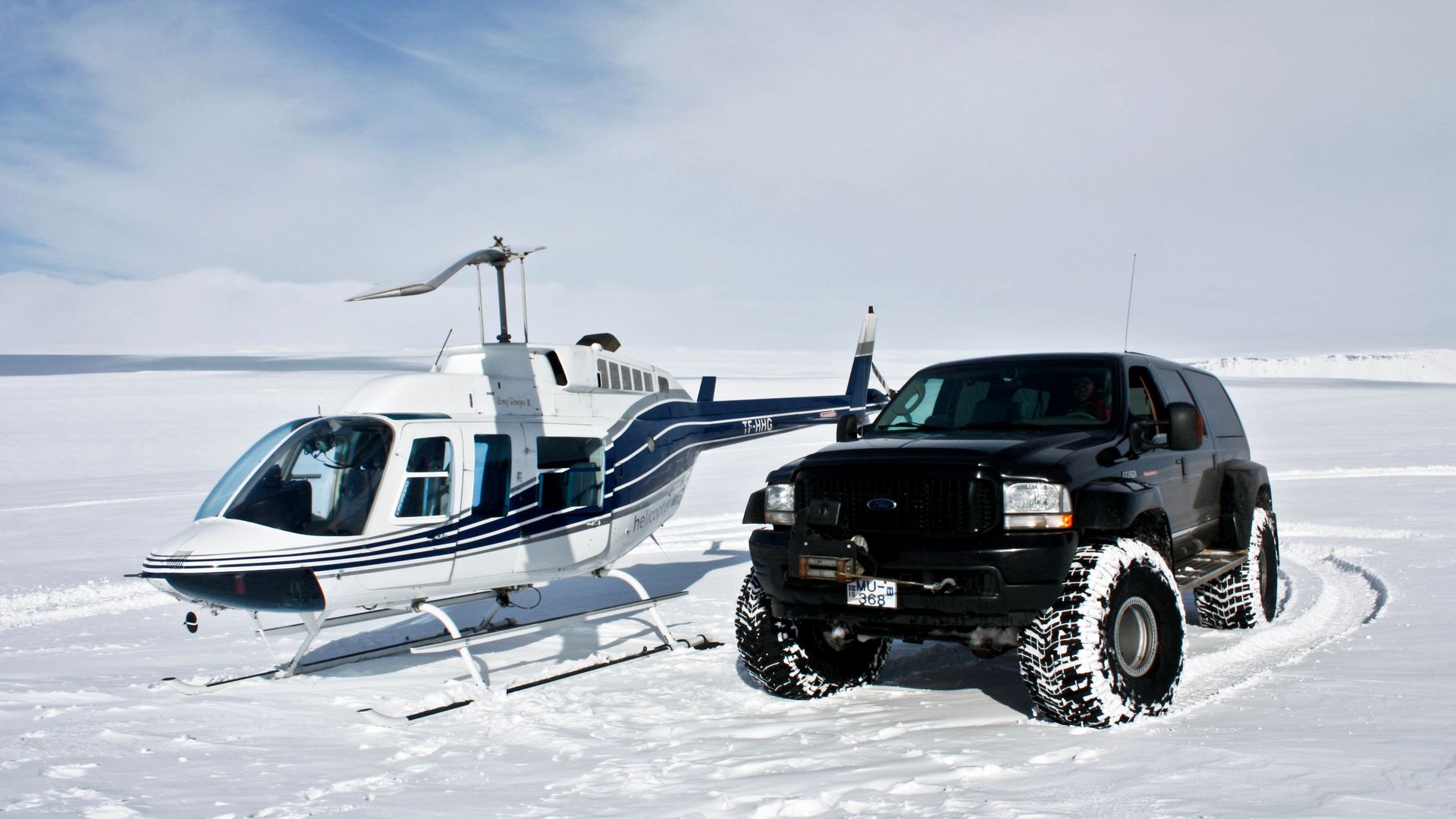 helicopter atop glacier