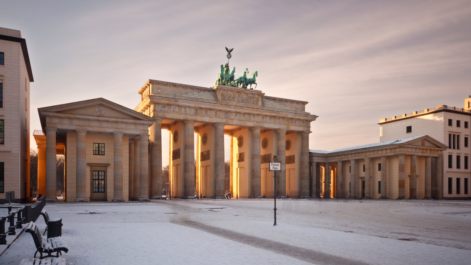The grand Brandenburg gate in Berlin dusted in snow