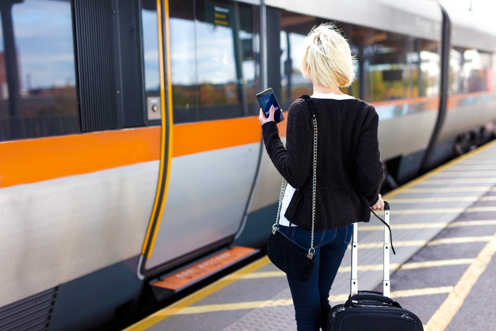 depositphotos woman waiting for train