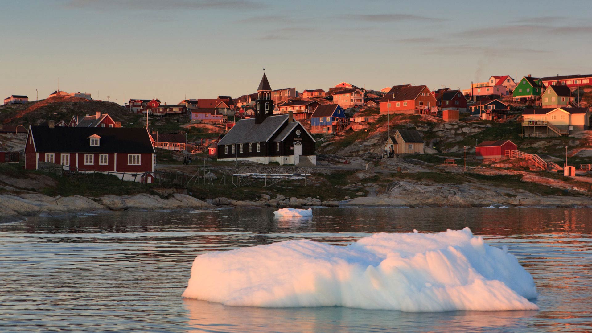 view of ilullissat village and iceberg
