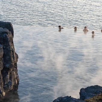 people swimming in the sky lagoon