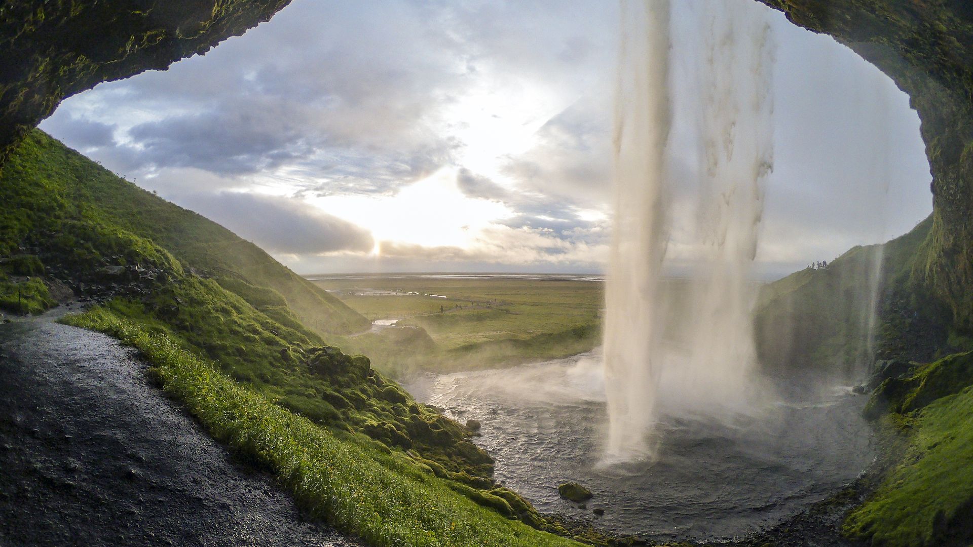 The Seljalandsfoss waterfall in Iceland has a romantic walking path
