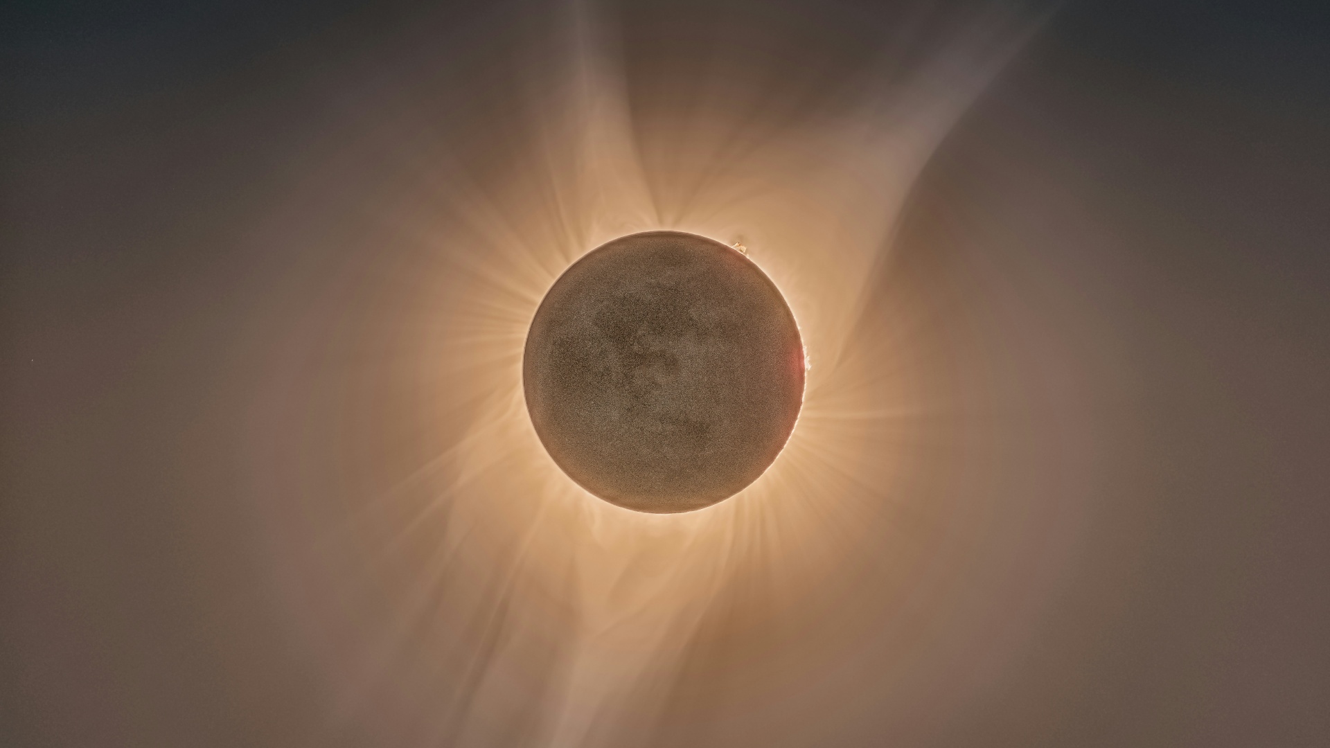 The light of the sun's atmosphere behind the moon during a solar eclipse