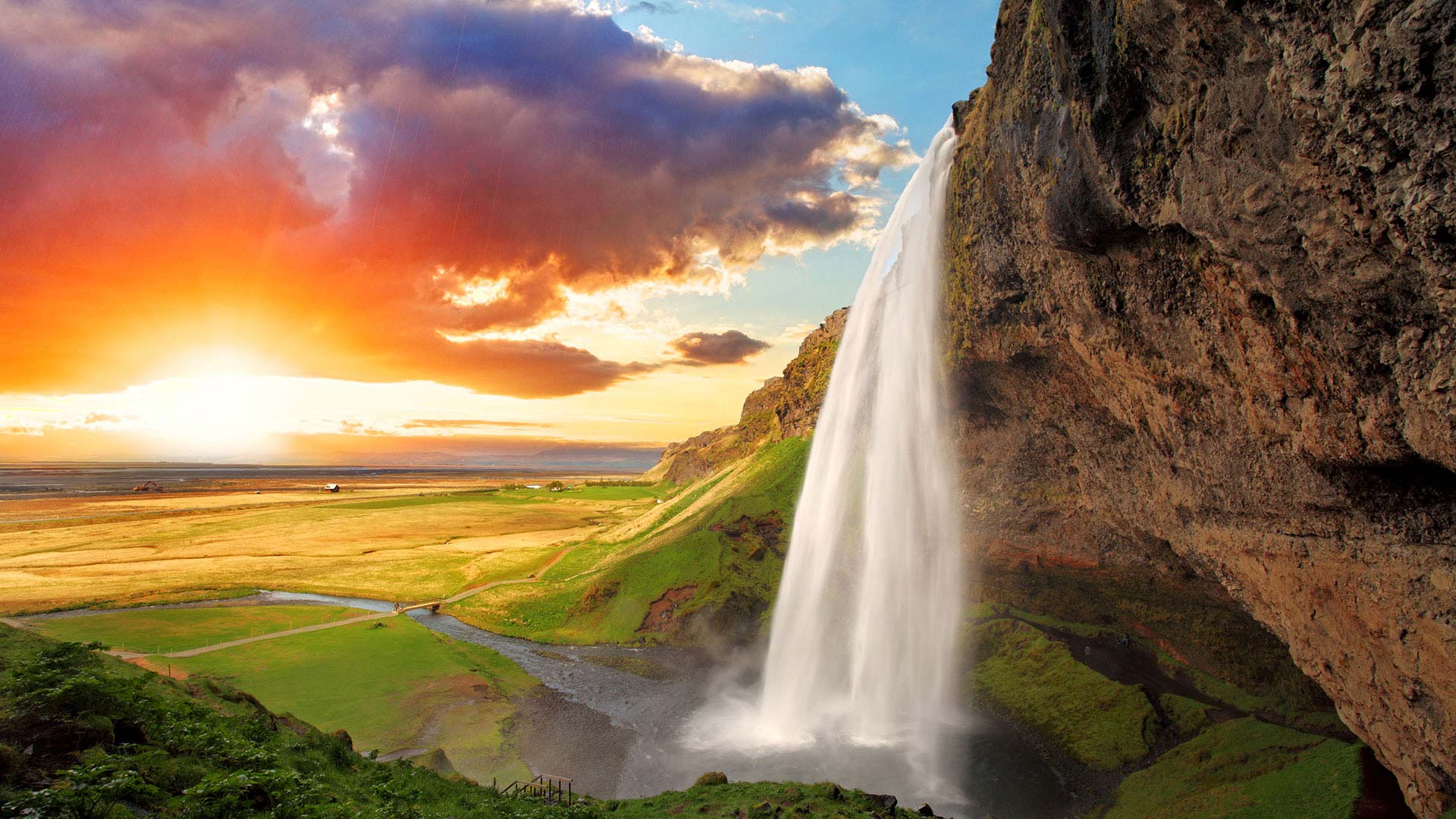 seljalandsfoss waterfall at sunset