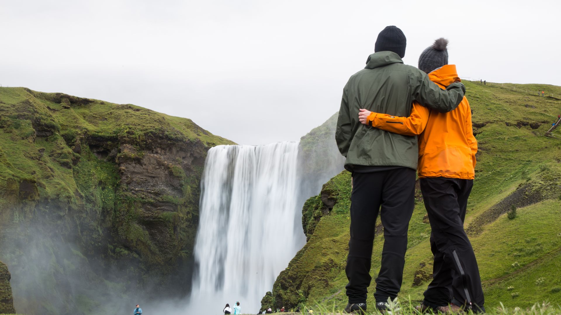 couple at skogafoss waterfall