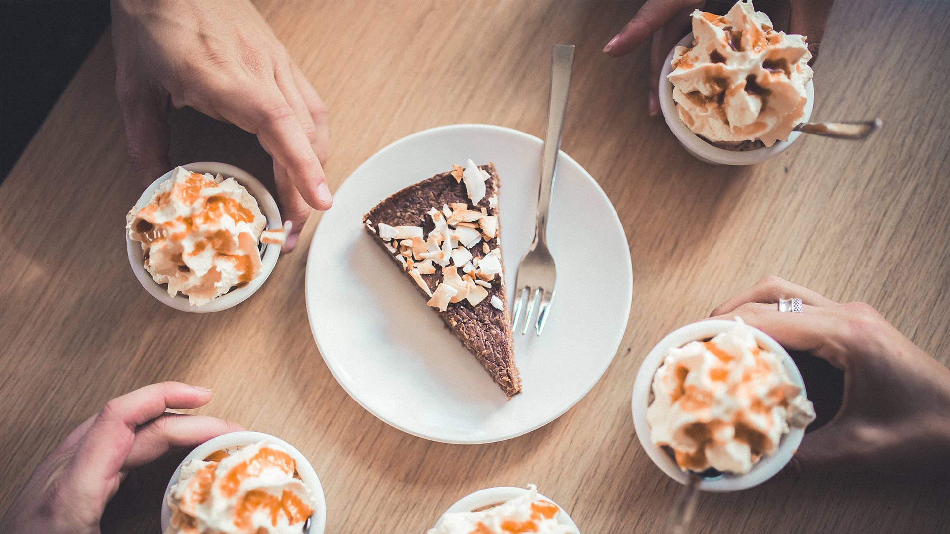 Friends sharing some delicious Icelandic cakes.