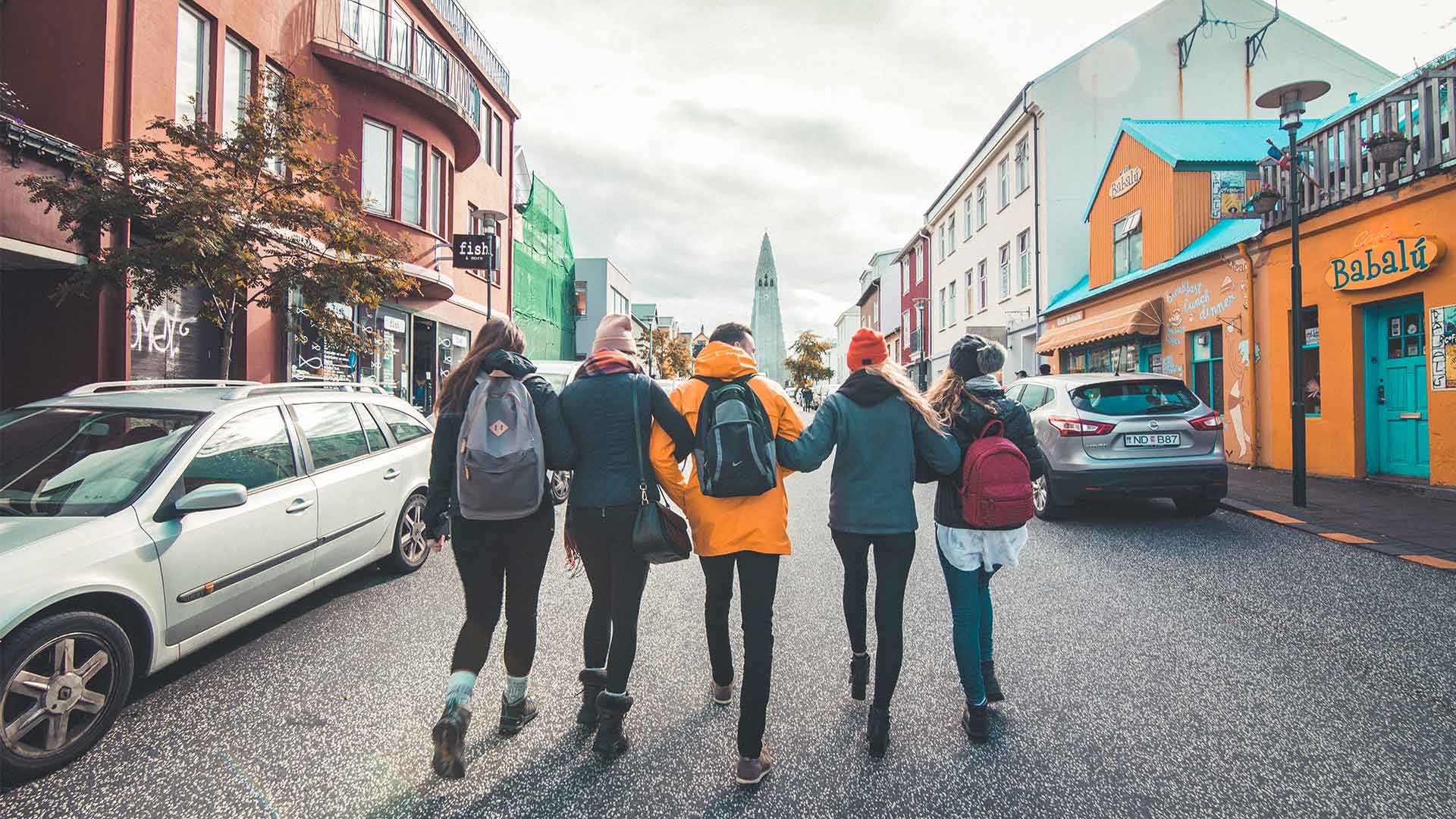 friends walking in reykjavik