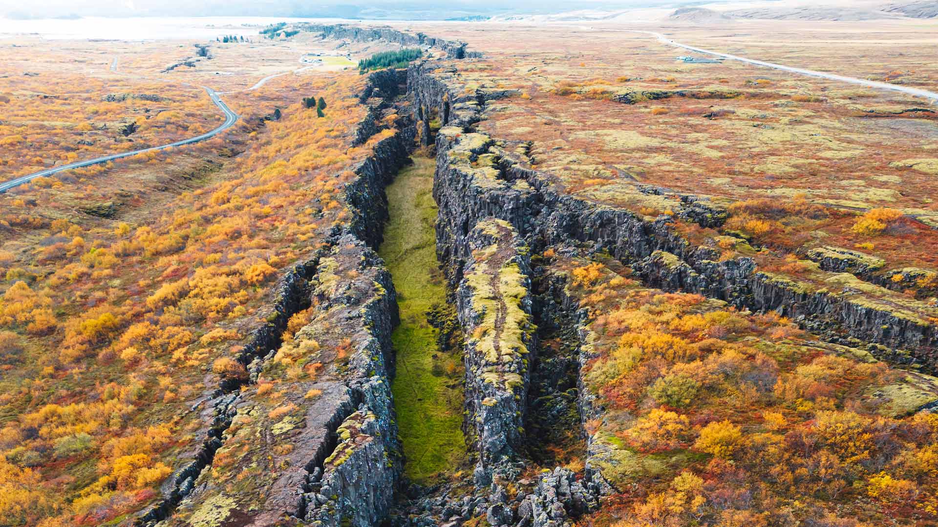 Visible rift valley where two tectonic plates meet at Þingvellir, Iceland