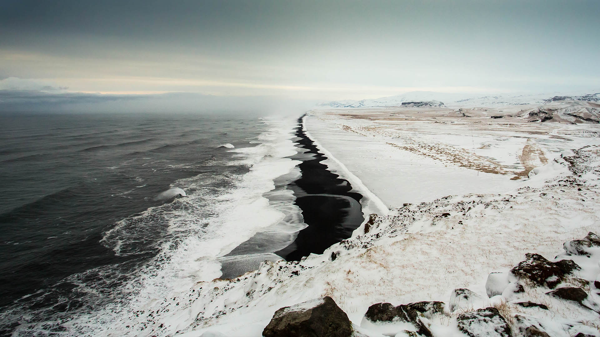 Black sand beach in winter from Dyrhólaey, Iceland