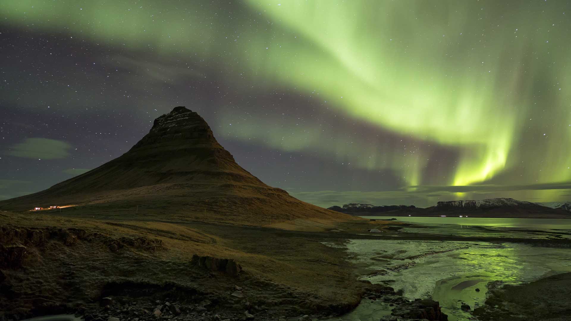 Northern lights over a church in Iceland