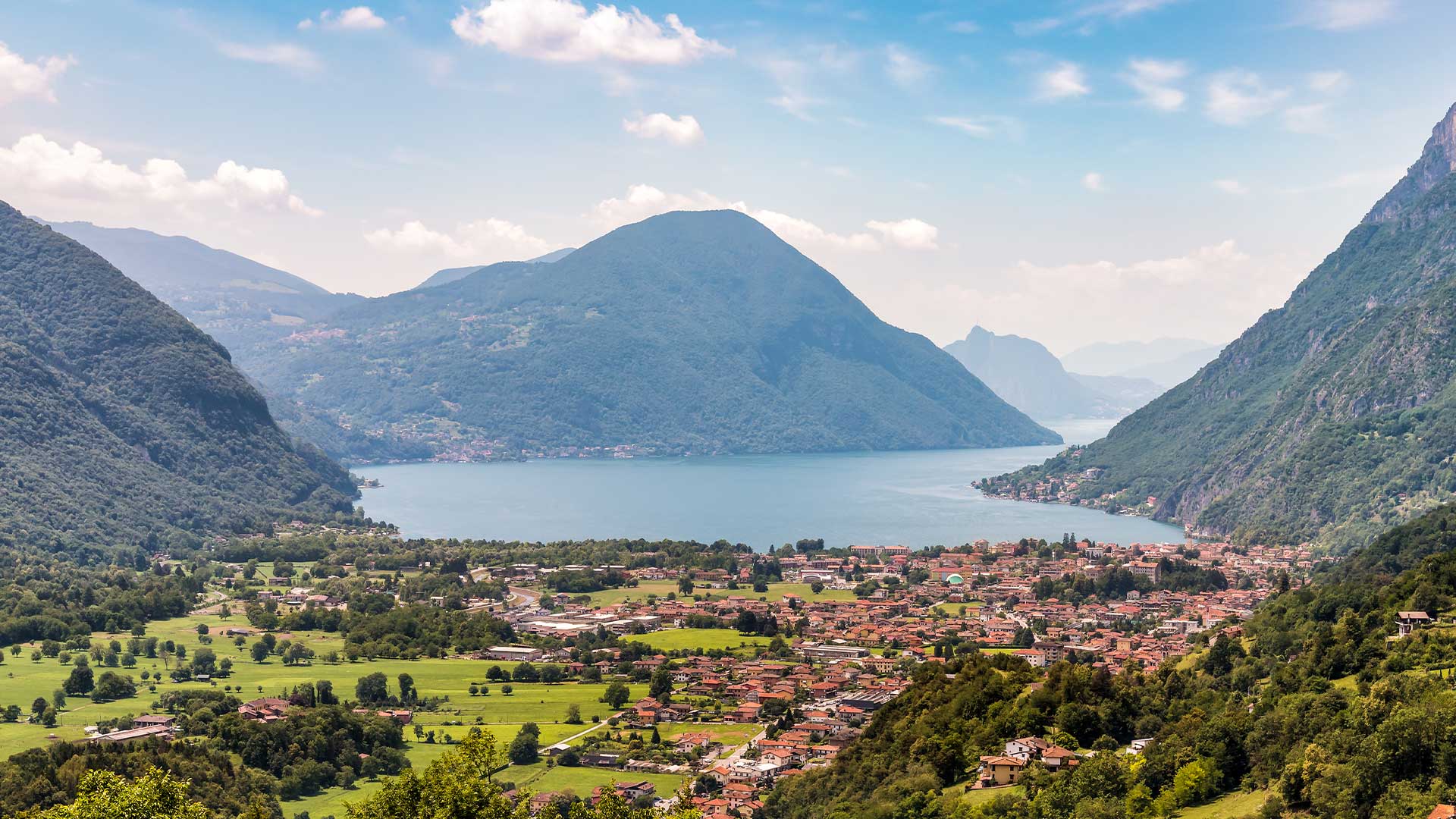 Panoramic views of Lake Lugano and its surrounding landscapes in summer