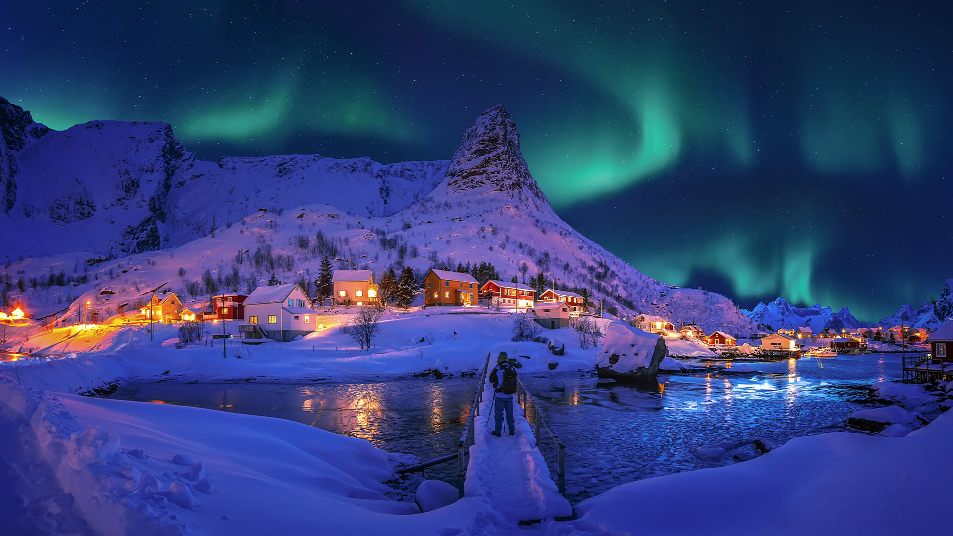 Aurora Borealis above Reinefjord in the Lofoten Islands