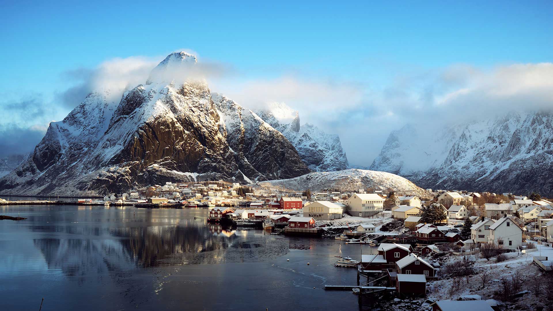 view of village of Reine in lofoten under the snow