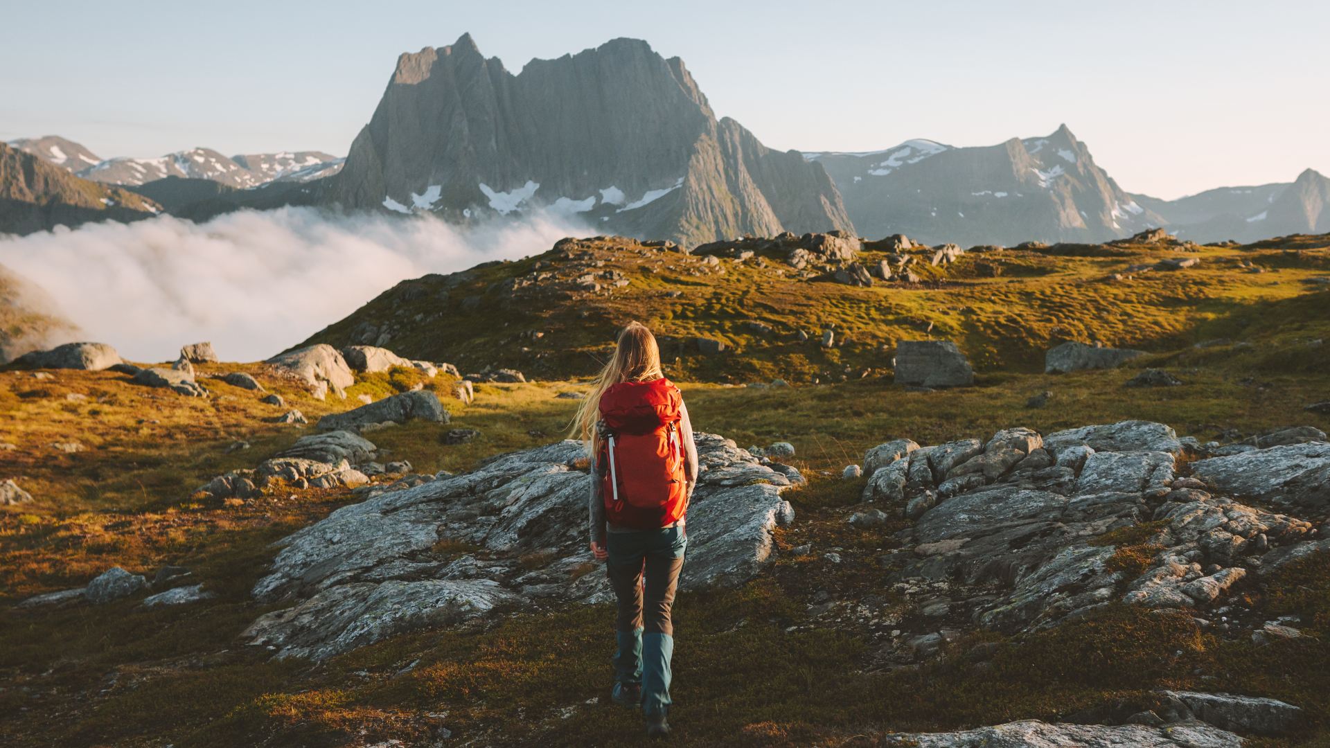 woman hiking in norway mountains