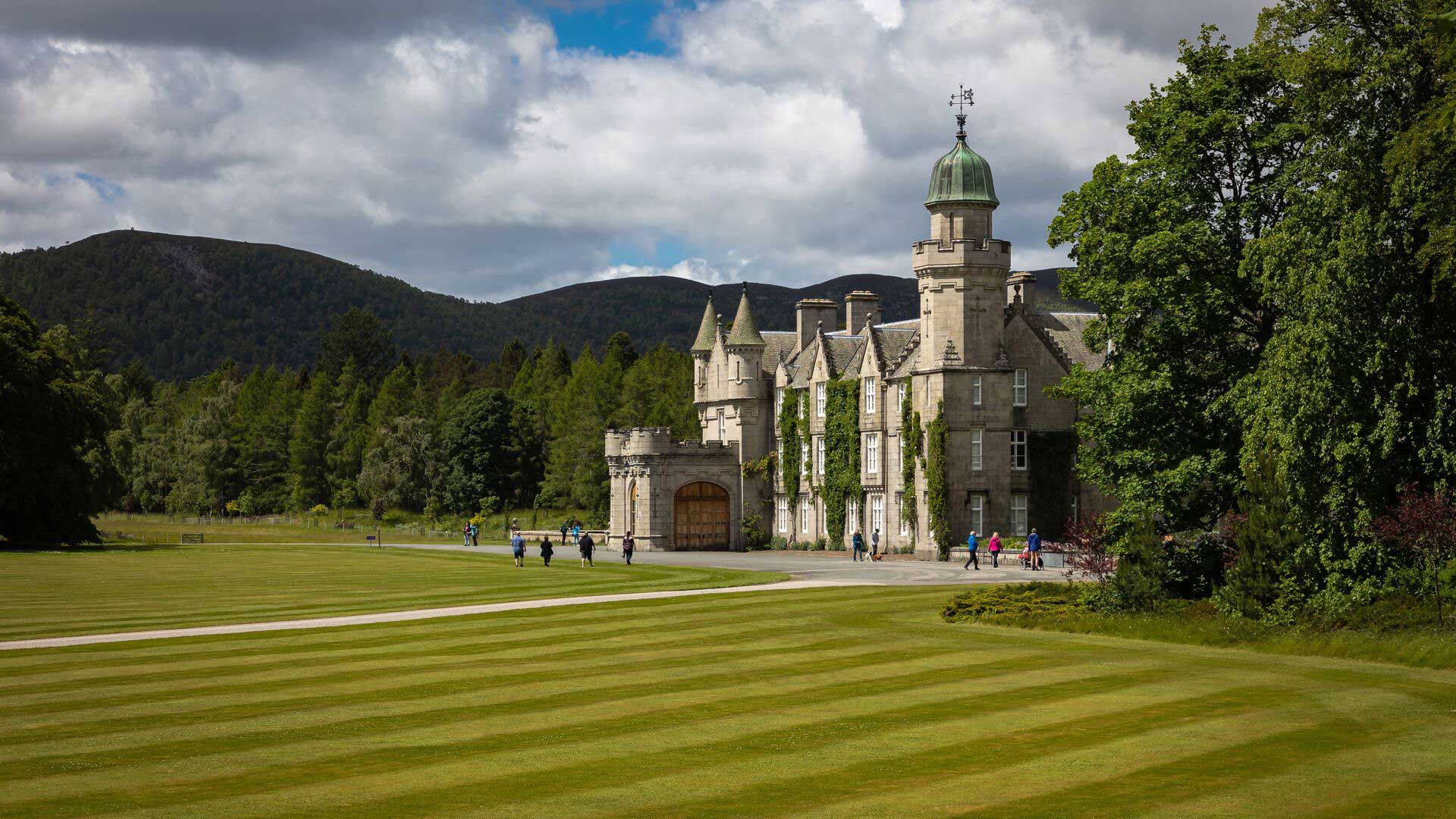 Balmoral Castle in Aberdeenshire Scotland with mountains in the background