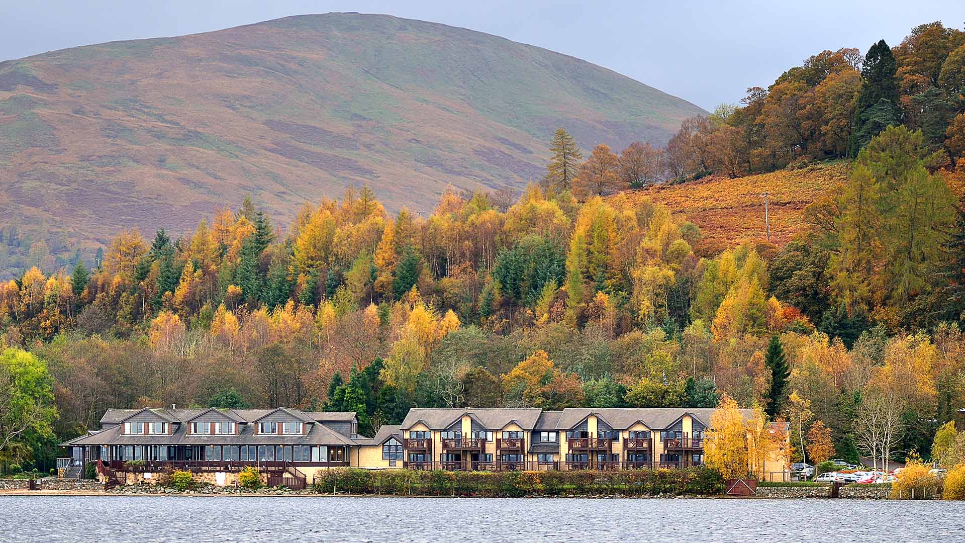 view of village of luss and colourful trees