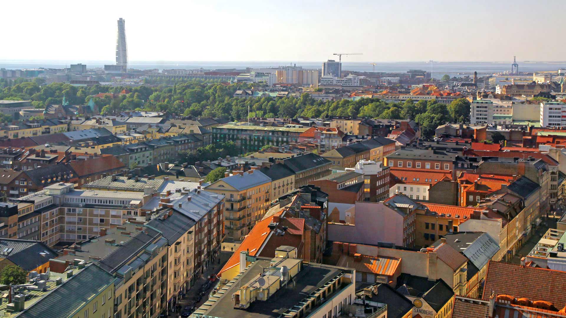 The modern Turning Torso tower seen over the rooftops of Malmö, Sweden