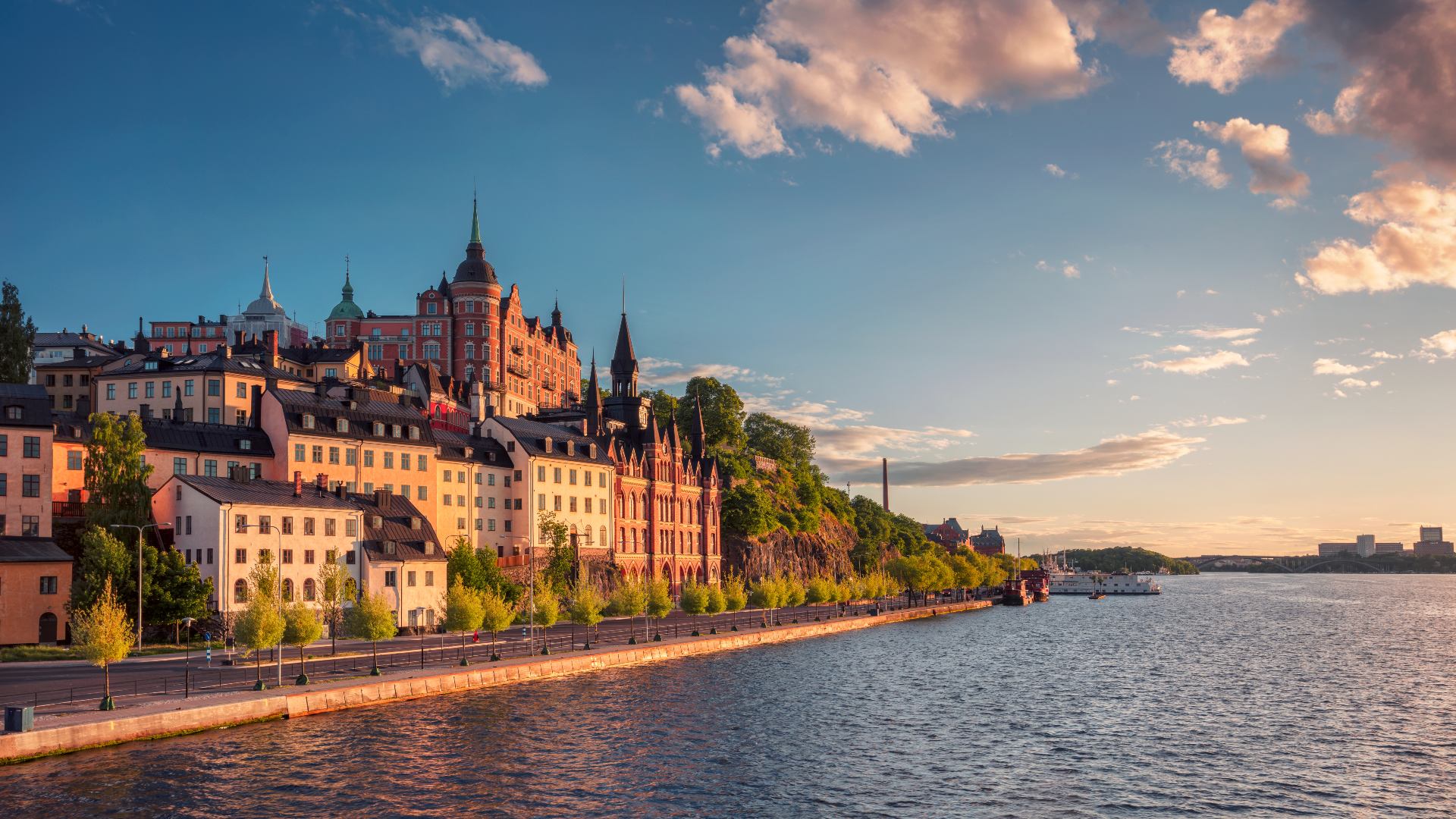 park and old buildings by the water in sodermalm