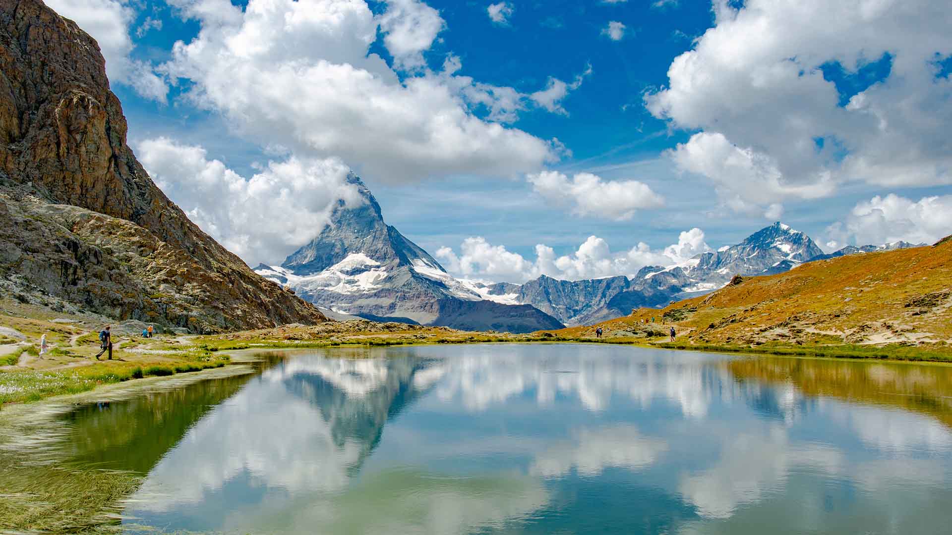 view of the matterhorn with hikers switzerland