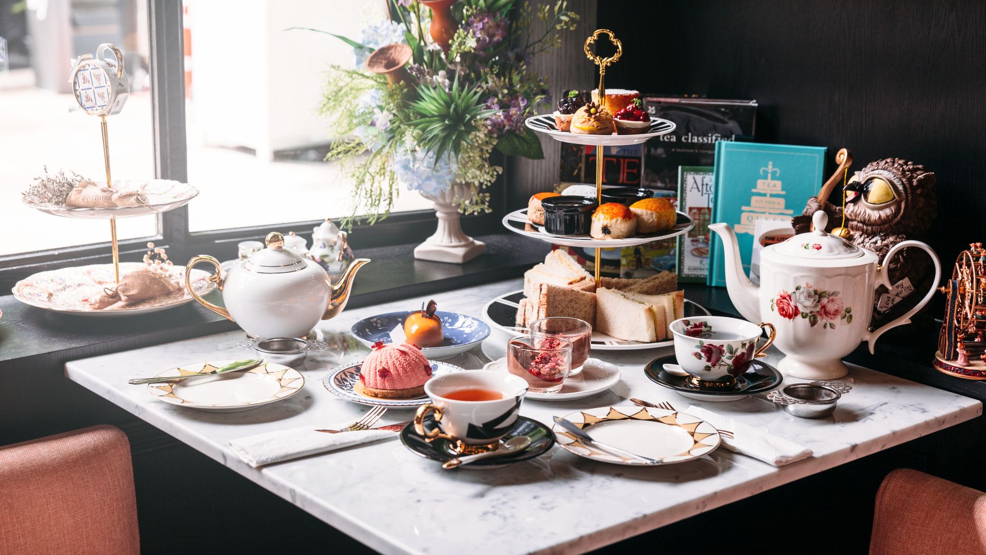 a charming and well decorated afternoon tea set up
