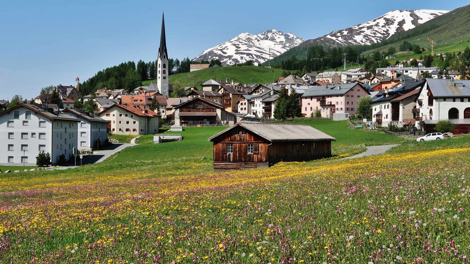 Traditional alpine buildings in the mountain village of Zuoz, Engadin, Switzerland